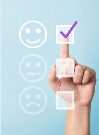 photo of take survey, finger selecting check box with symbol of happy face